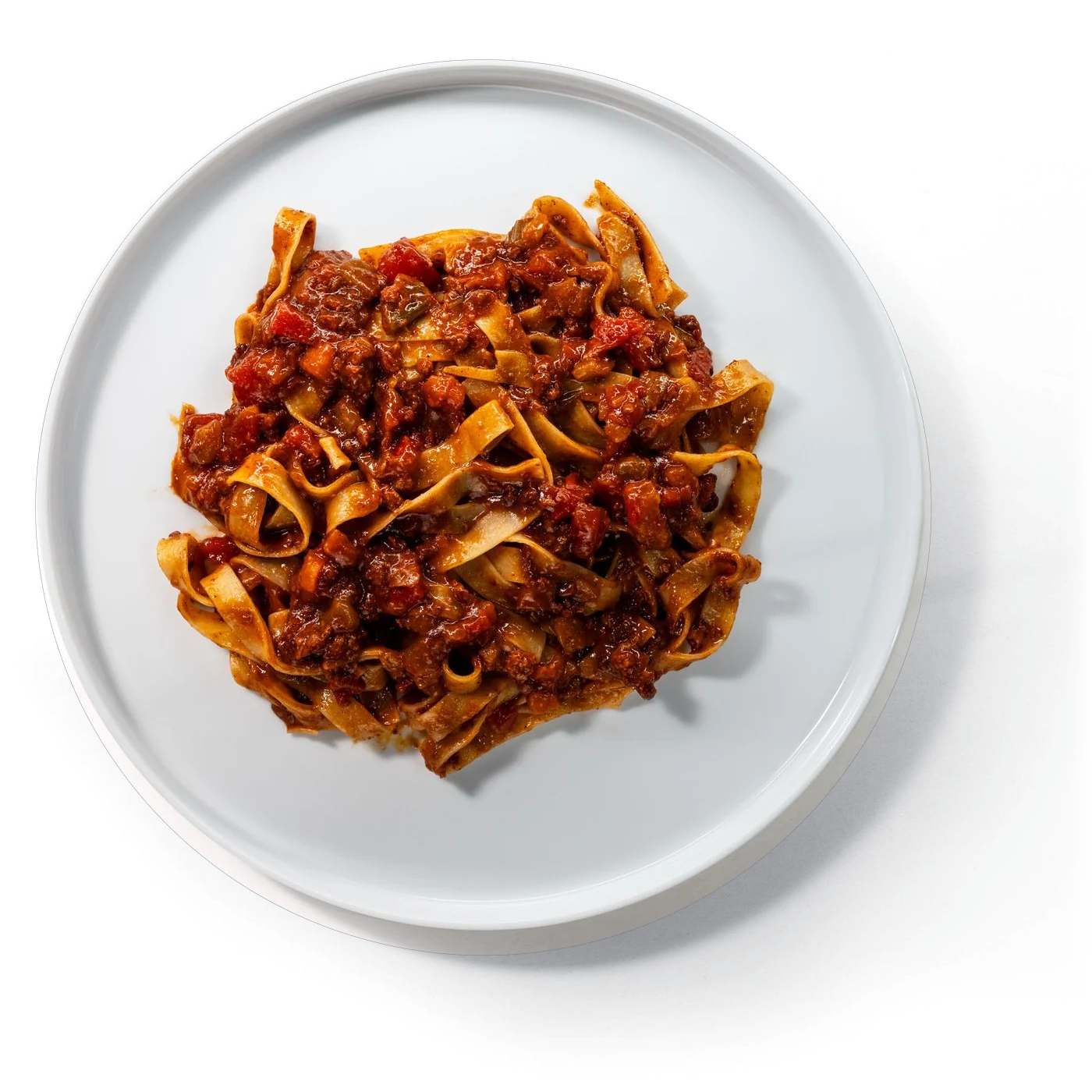 Ein Teller Pasta mit 3foodies Bolognese Originale, von oben fotografiert